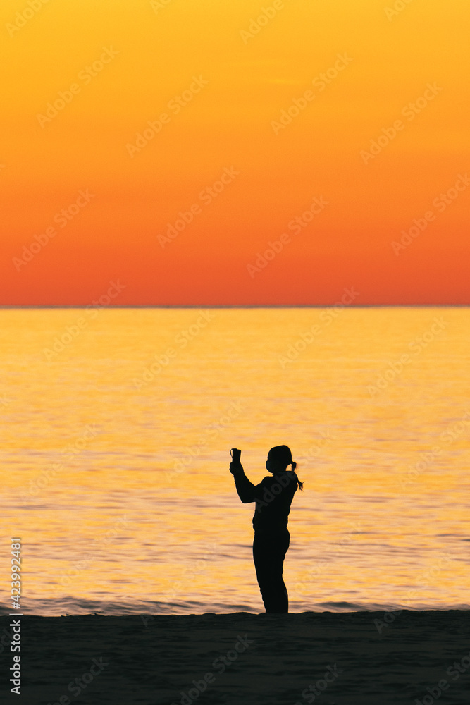 Taking a photo at sunrise