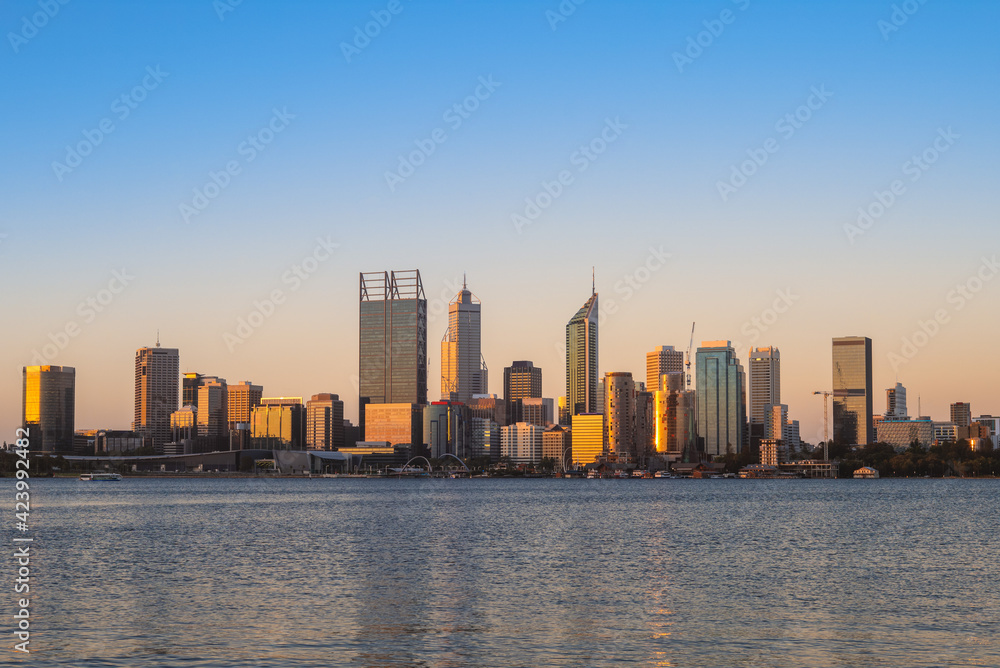 skyline of perth at night by swan river in western  australia