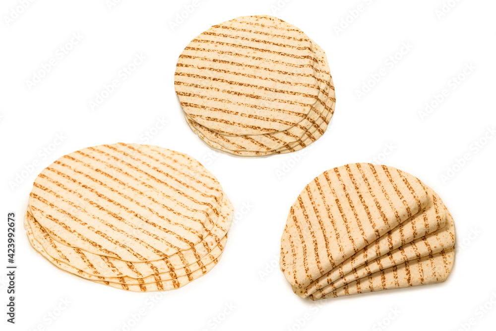 Grilled pitta bread isolated on white background. Grilled pitta bread isolated on white background.