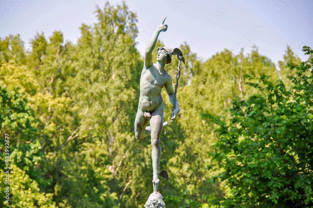 Flying Mercury sculpture in autumn in Pavlovsky park, Saint Petersburg, Russia