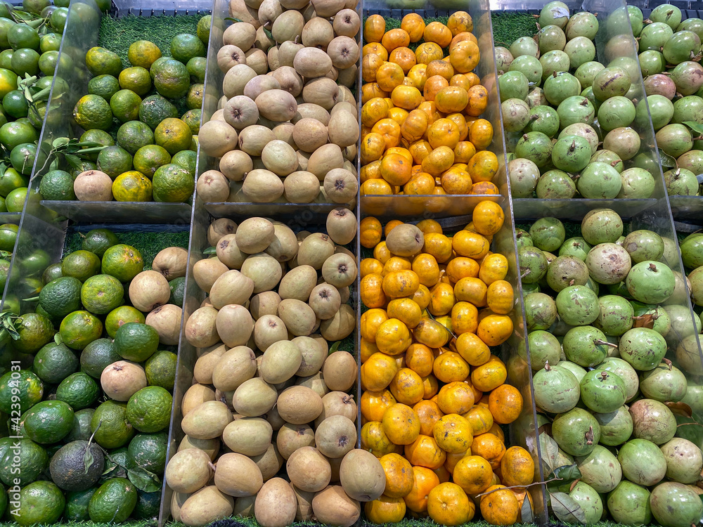 Assortment of tropical fruits for sale at Asian supermarket