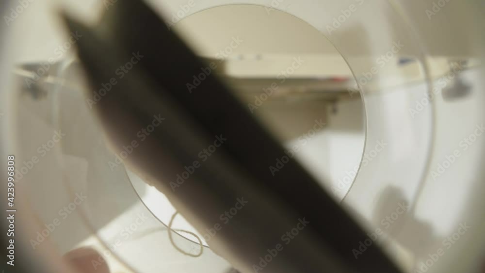 Camera in a glass, bottom view. The man takes out a tea bag and puts it in a glass. Close-up. Camera in a glass, bottom view. The man takes out a tea bag and puts it in a glass. Close-up.