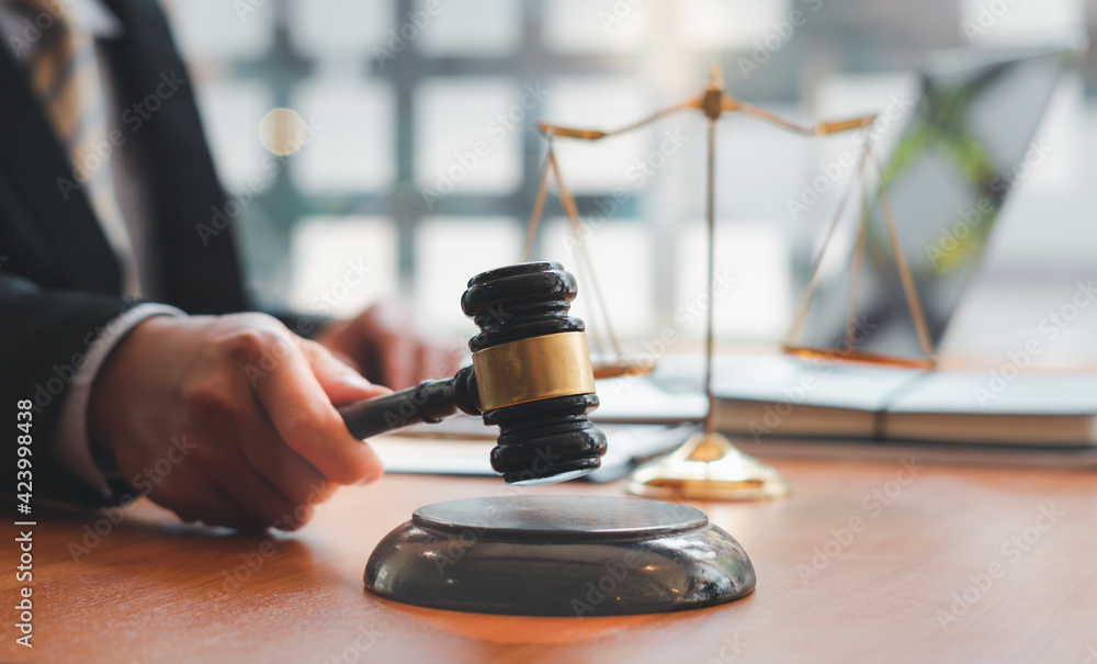lawyer or judge work in the office with Judge gavel, Legal law, advice, and justice concept. lawyer or judge work in the office with Judge gavel, Legal law, advice, and justice concept.