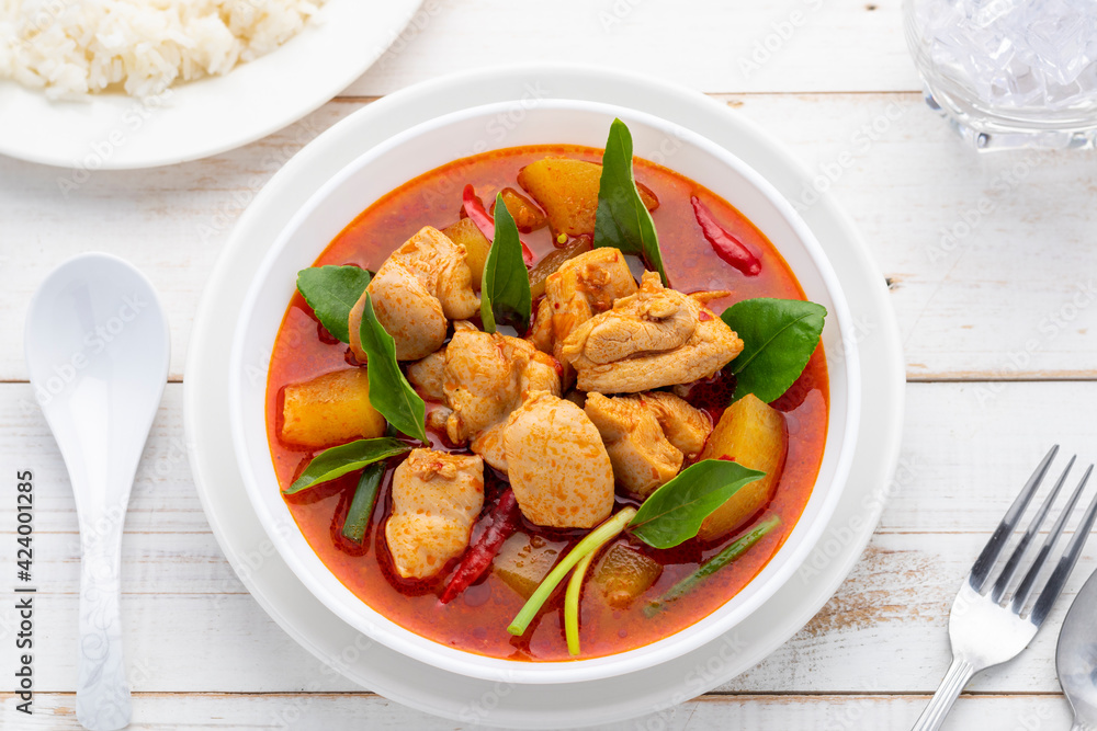 Chicken curry, without coconut milk, with winter melon, a simple savory dish in Isan Thai food style often including lemon basil to enhance flavor and aroma. Chicken curry, without coconut milk, with winter melon, a simple savory dish in Isan Thai food style often including lemon basil to enhance flavor and aroma.
