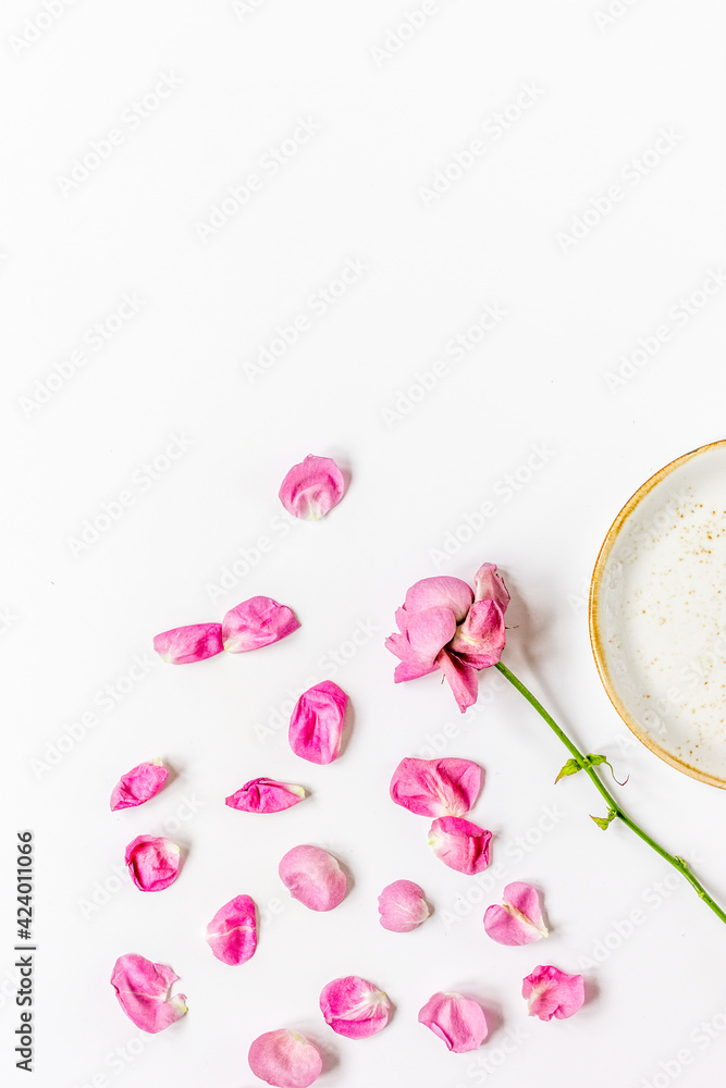 woman table with rose flower top view white background space for text woman table with rose flower top view white background space for text