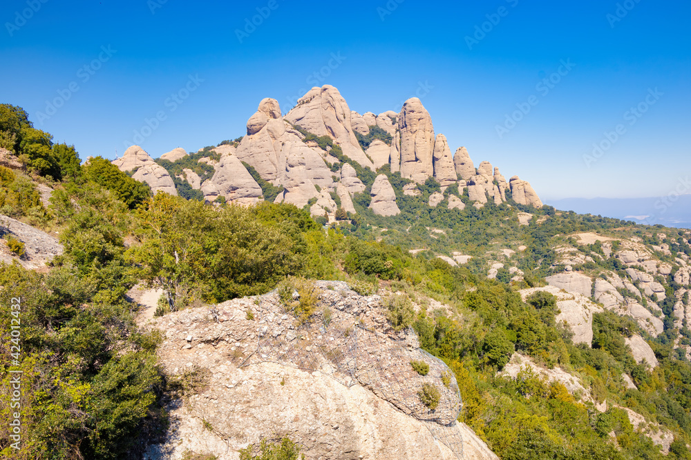 View from the viewpoint of the Sierra Paparres of different peaks that make up the Natural Park of the Montserrat massif, Catalonia, Spain