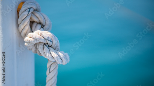 Mooring Rope Tied On Dock Ship