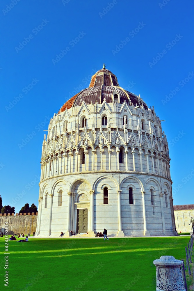 Baptistery of San Giovanni, one of the monuments of the Piazza del Duomo in Pisa in Tuscany, Italy. 