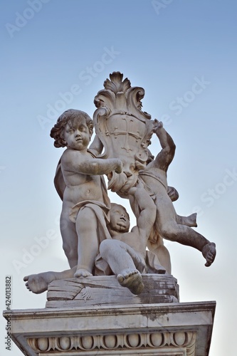 details of the Fontana dei Putti located in the Piazza del Duomo in the city of Pisa in Tuscany, Italy