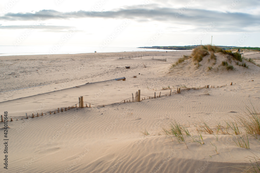 The sandy coastline at South Shields beach, a seaside town near Newcastle upon Tyne in the North East of England. The sandy coastline at South Shields beach, a seaside town near Newcastle upon Tyne in the North East of England.