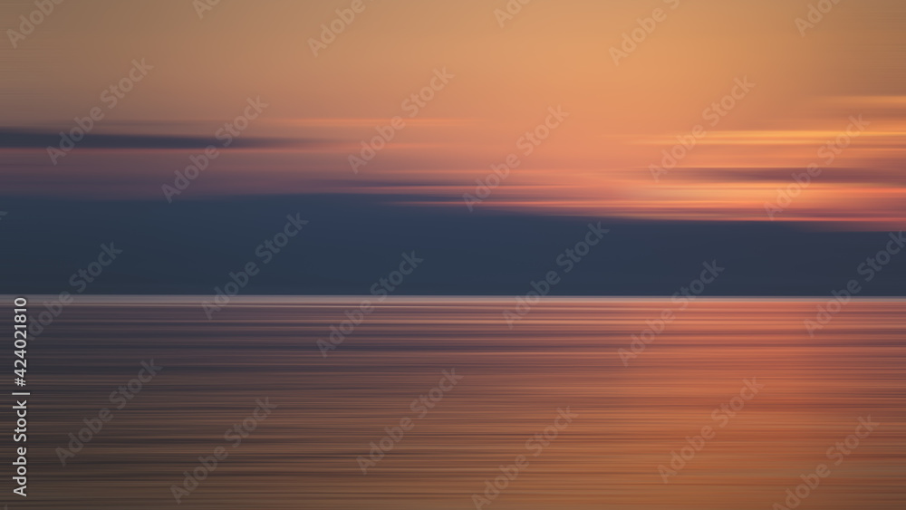 Abstract motion blur landscape sunset over the sea of Poetto beach