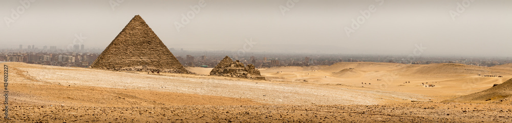 Panorama view of the pyramid of Menkaure, one of the three ancient Egyptian pyramids of Giza Panorama view of the pyramid of Menkaure, one of the three ancient Egyptian pyramids of Giza
