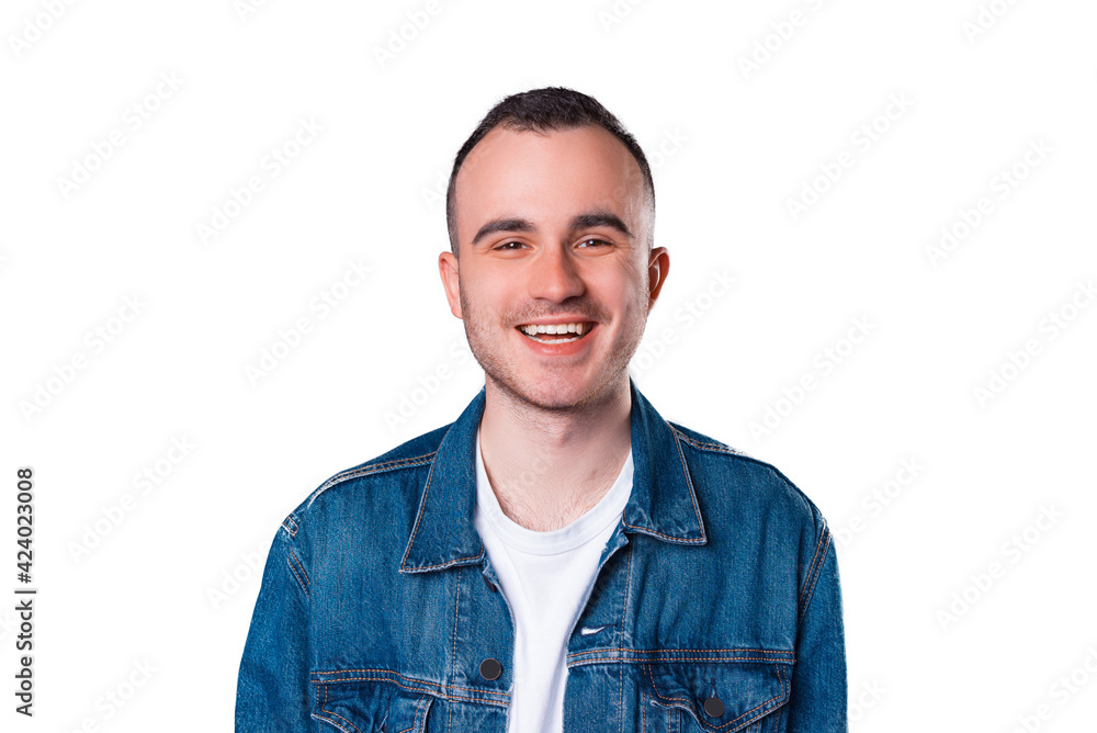 Portrait of smiling handsome young man wearing blue jeans jacket Portrait of smiling handsome young man wearing blue jeans jacket
