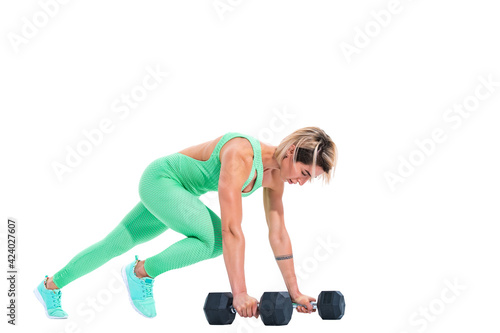 woman doing plank exercise on dumbbells isolated over white background