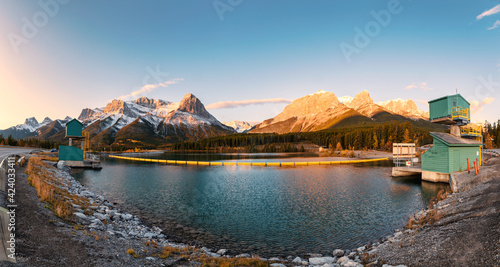 Sunrise on mount Rundle, Ha-Ling and Lady Macdonals mountain in autumn forest at Rundle Forebay reservoir
