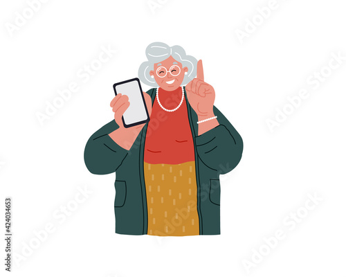 An elderly grandmother is holding a cell phone.Senior people using smart devices. Grandma calls for attention.
