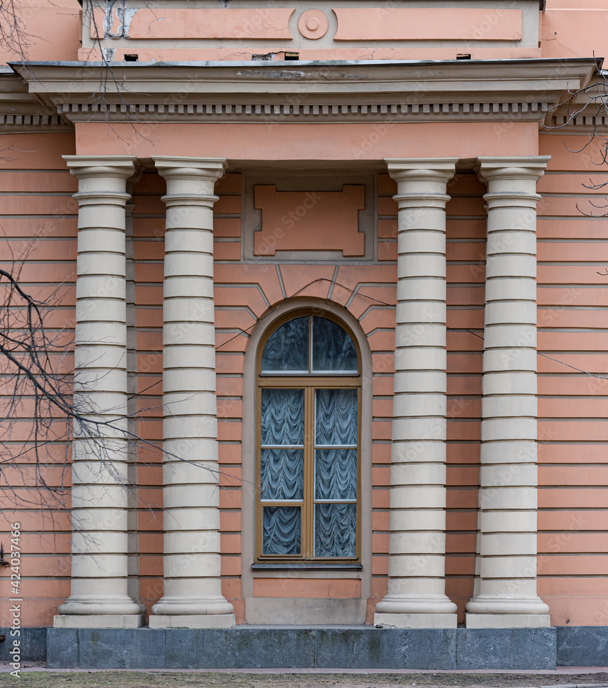Windows in the city in the old style, with stucco, decorative elements Windows in the city in the old style, with stucco, decorative elements