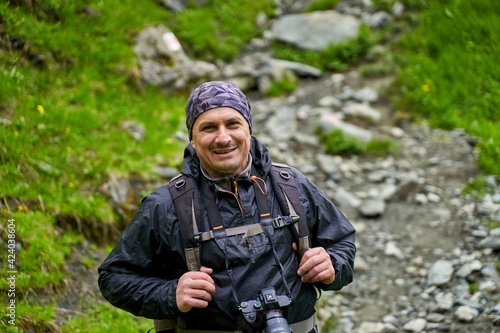 Professional nature photographer in the mountains