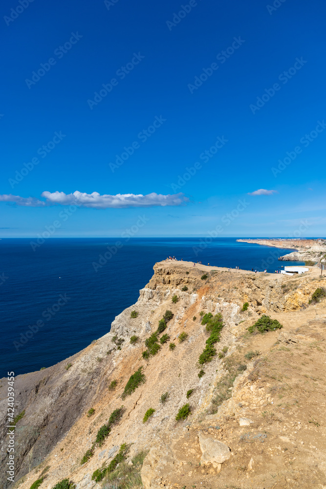Cape Fiolent in Crimea. Beautiful views of the Black Sea coast at Cape Fiolent in summer. Sea coast with turquoise water and rocks