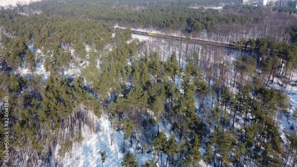 Aerial photography. Drone shooting in a winter snowy forest Aerial photography. Drone shooting in a winter snowy forest