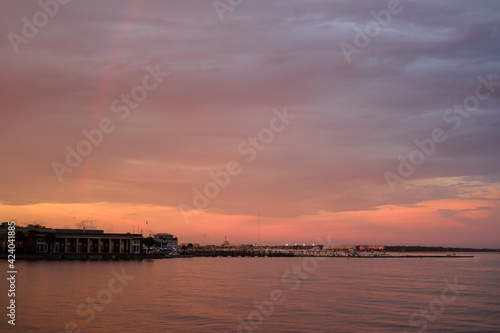 Sunset with Rainbow  Boats and Vibrant Colors over Ashley River in Charleston South Carolina from Battery