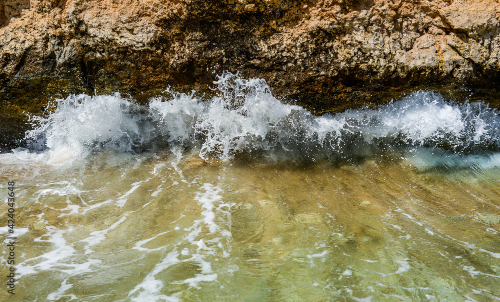 sea waves crash against rocks during a storm in Sharm El Sheikh, Egypt sea waves crash against rocks during a storm in Sharm El Sheikh, Egypt