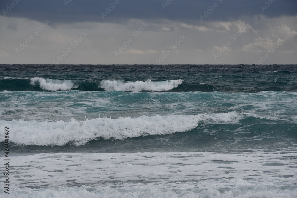 Mediterranean Sea waves rolling ashore during stormy weather in Ayia Napa, Cyprus