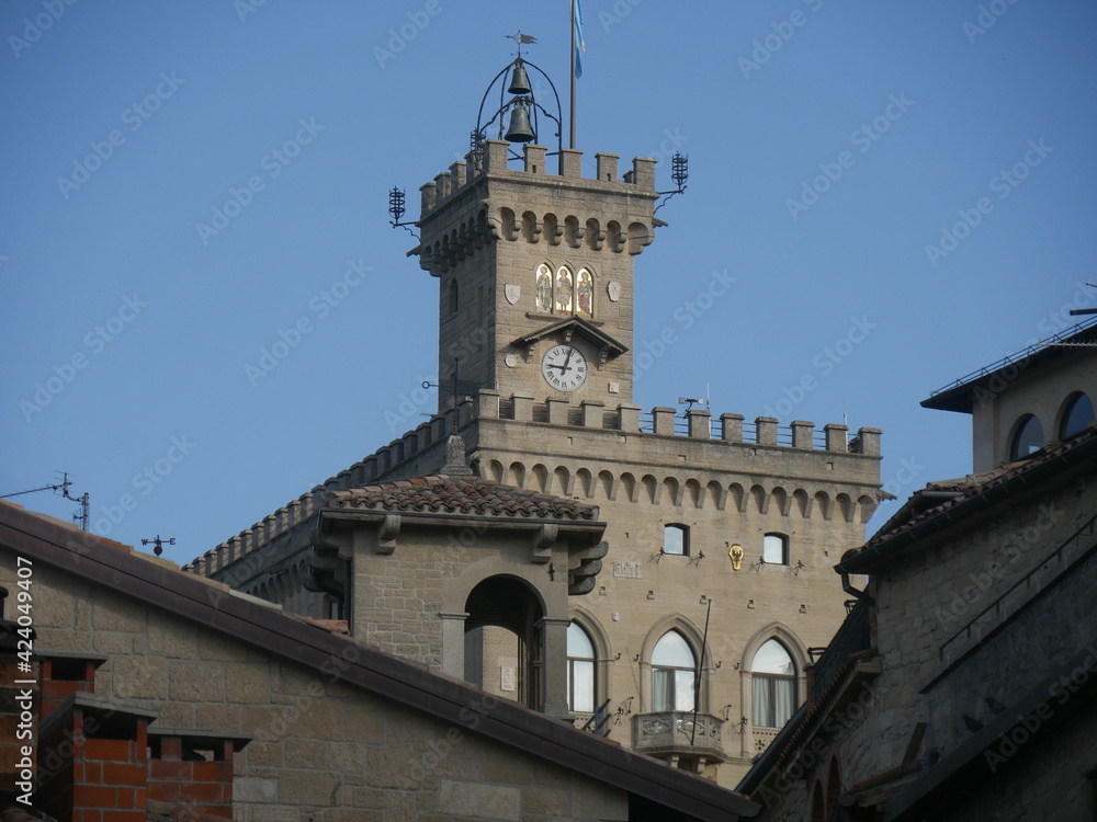 San Marino - Public Palace with the crenellated clock tower, the mosaic and the coats of arms of the four castles