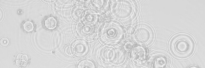 Water panoramic banner background. White water texture, blue mint water surface with rings and ripple. Spa concept background. Flat lay, top view, copy space, square composition with copy-space.