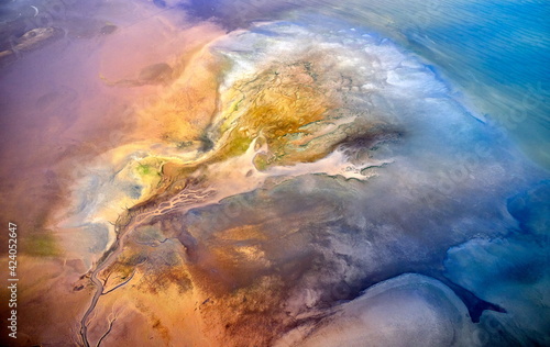 Dry lake or swamp in the process of drought and lack of rain or moisture, a global natural disaster - aerial drone view