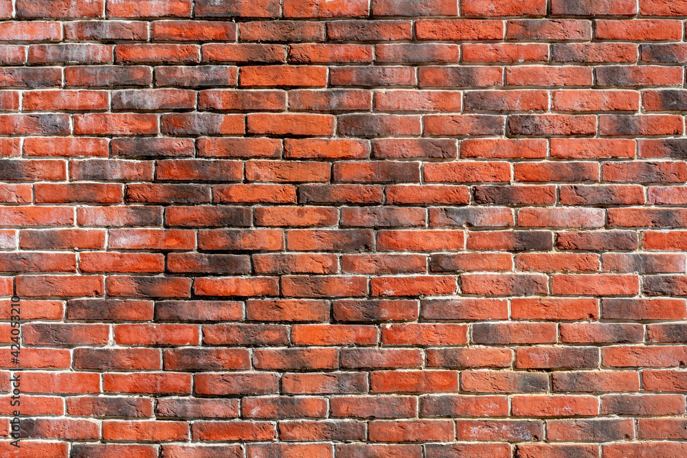 Fototapeta premium Red brick building wall. Interior of a modern loft. Background for design