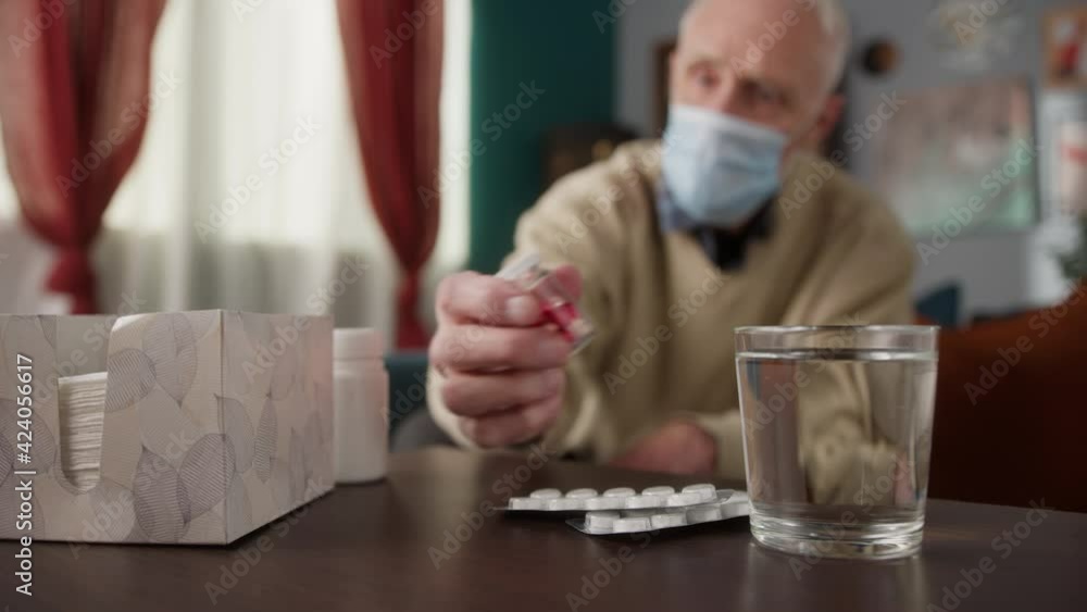 Old Man hold many multi-colored pills in a Senior's hands, antibiotic and vitamin drugs. Caring for the health of the elderly, nursing home hospital, coronavirus covid 19 vaccination Old Man hold many multi-colored pills in a Senior's hands, antibiotic and vitamin drugs. Caring for the health of the elderly, nursing home hospital, coronavirus covid 19 vaccination