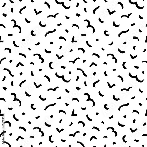 Geometric vector seamless pattern in Memphis style. Grunge rough brushstrokes  wavy lines  dashes  triangles. Hand drawn black ink illustration. Hipster black paint geometric background.
