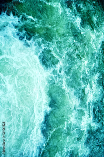 Whirlpools Waves of water of the waves from a waterfall © Inna Vlasova