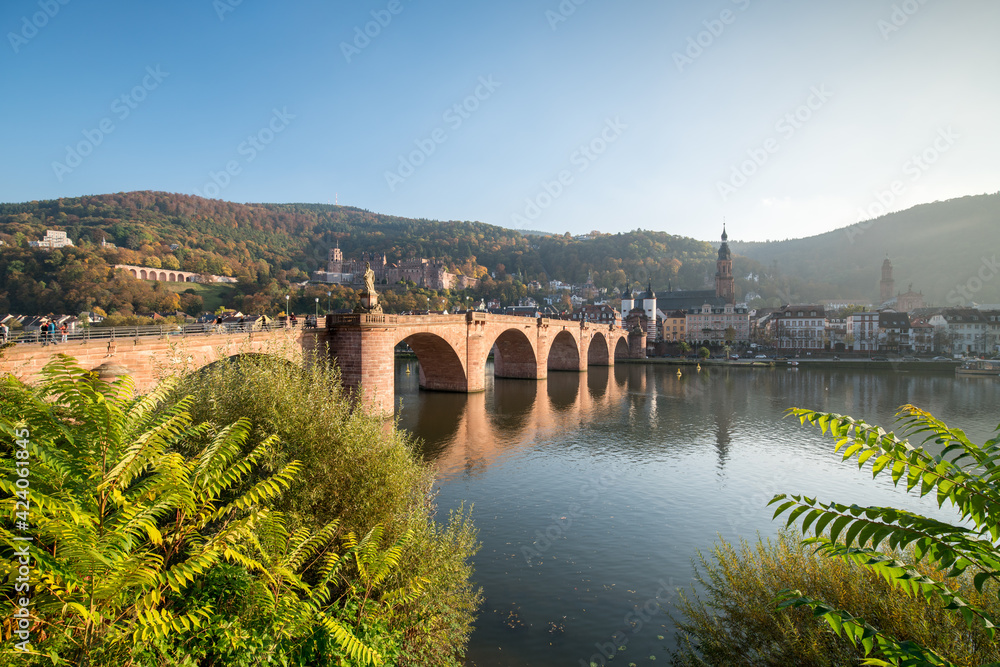 Fototapeta premium Old Bridge and Heidelberg Castle in autumn, Baden-Wuerttemberg, Germany
