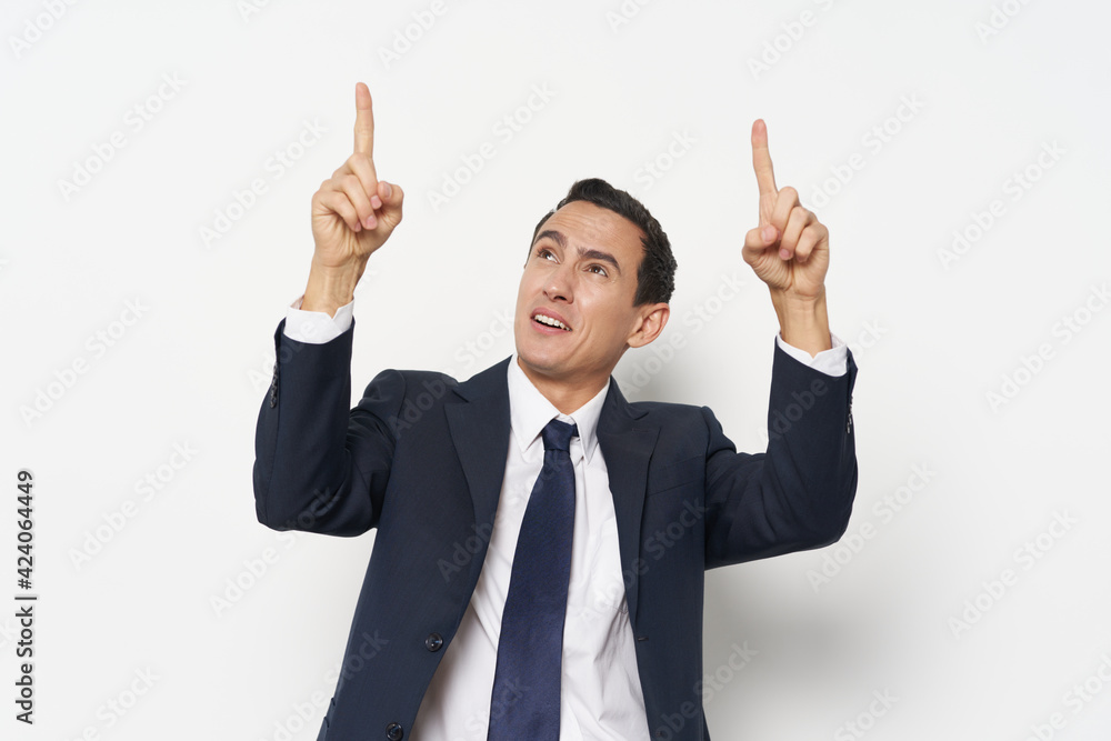 business man in a suit gesturing with his hands an official business man in a suit gesturing with his hands an official