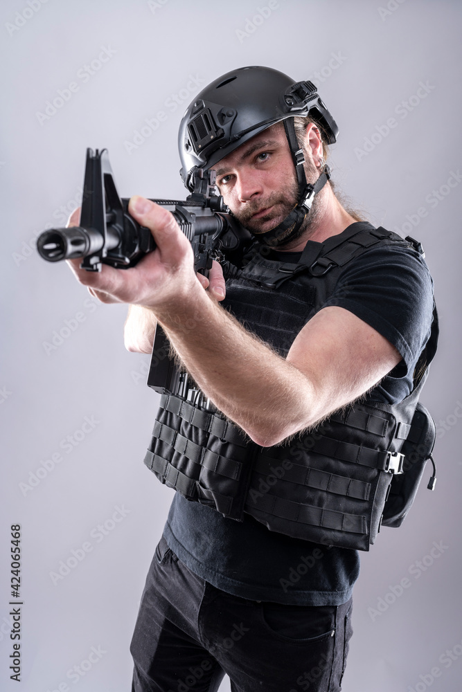 Male ready to shoot in full airsoft equipment Male ready to shoot in full airsoft equipment