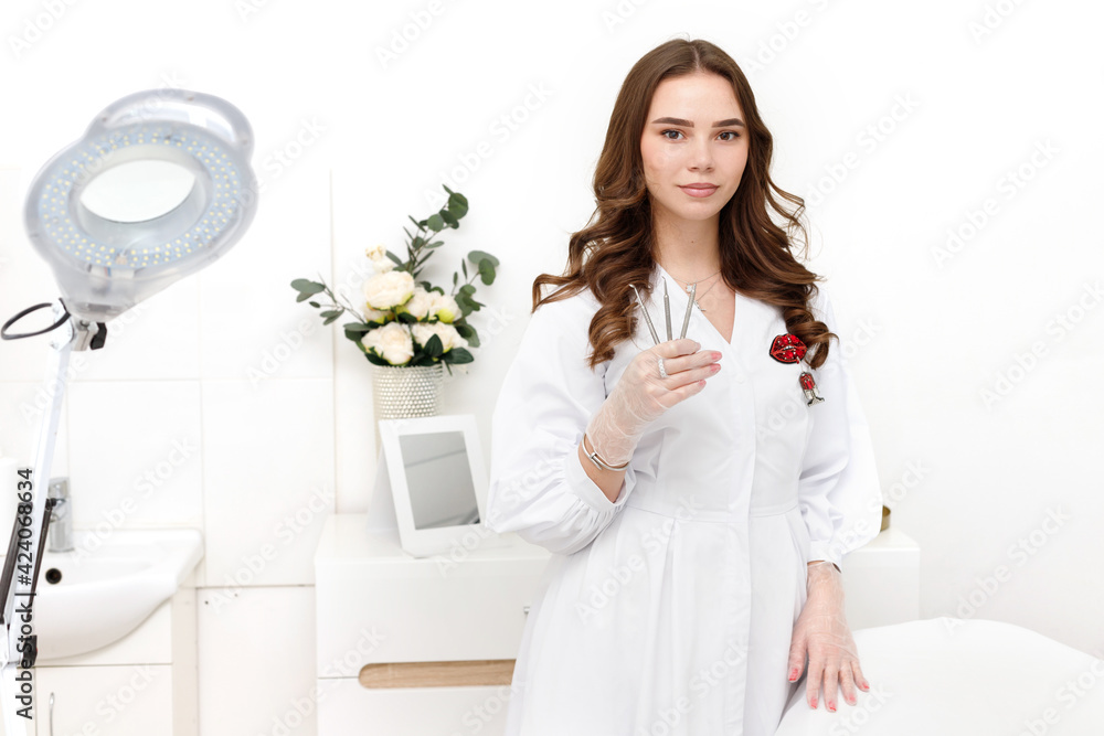 female beautician in the office at the reception female beautician in the office at the reception