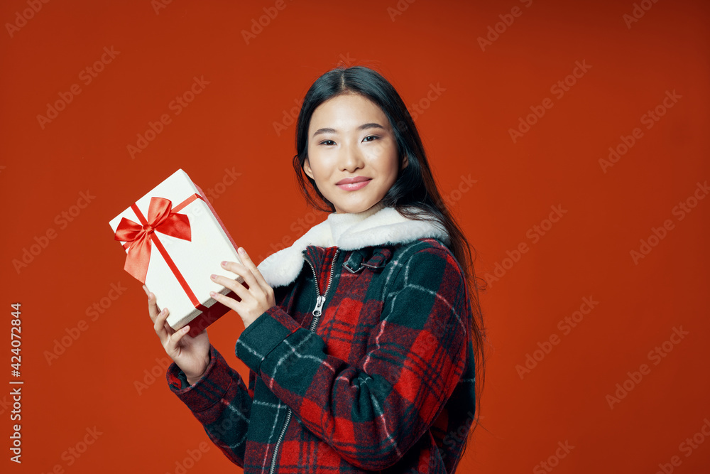 woman asian appearance gift christmas holiday red background woman asian appearance gift christmas holiday red background