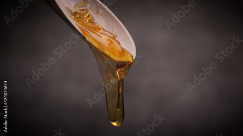 Macro shot of flowing honey - studio photography