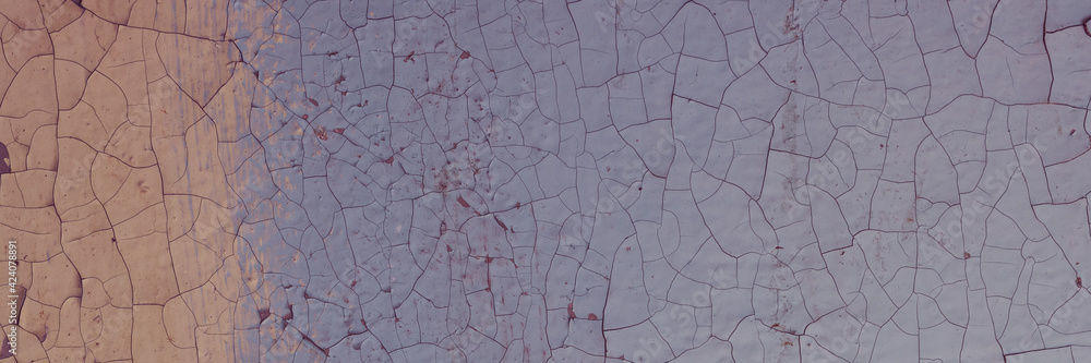 Peeling paint on the wall. Panorama of a concrete wall with old cracked flaking paint. Weathered rough painted surface with patterns of cracks and peeling. Wide panoramic texture for design background Peeling paint on the wall. Panorama of a concrete wall with old cracked flaking paint. Weathered rough painted surface with patterns of cracks and peeling. Wide panoramic texture for design background