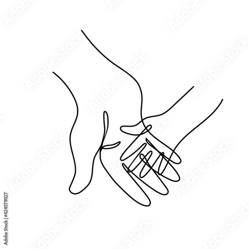 Adult parents hand holding childs hand.