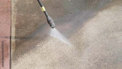 Slow Motion Video 4K Water that washes high-pressure floors from a pressure washer.