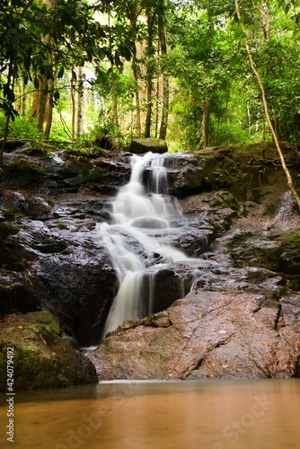 Kathu waterfall in Phuket, Thailand. Beautiful cascade in the jungle.