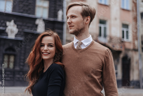 Smiling couple in love on date at springtime outdoor
