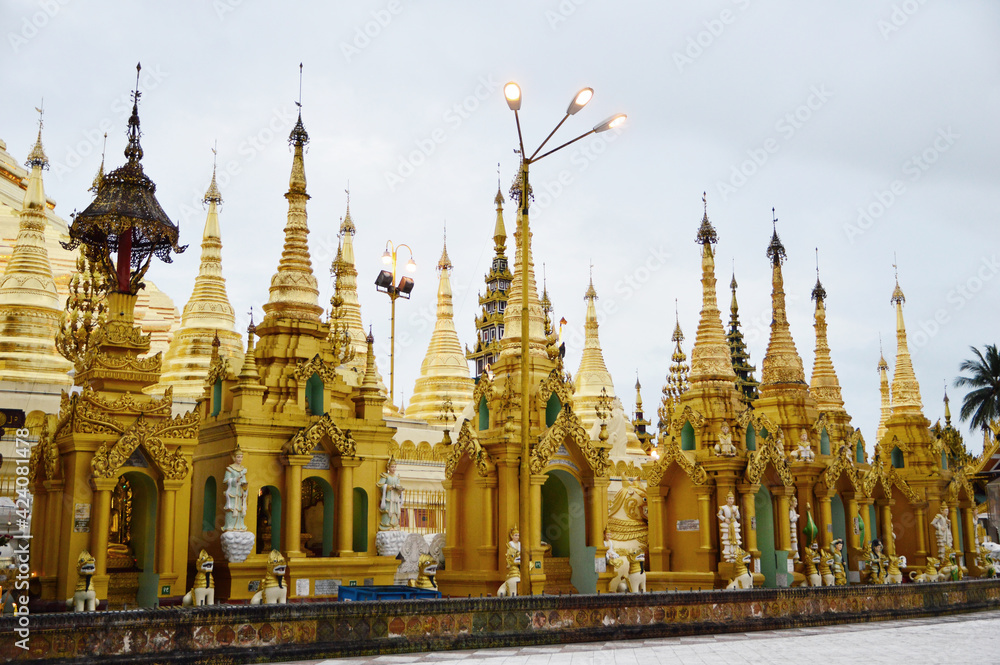 Naklejka premium Small stupas lining up inside Shwedagon Pagoda in Yangon, Myanmar