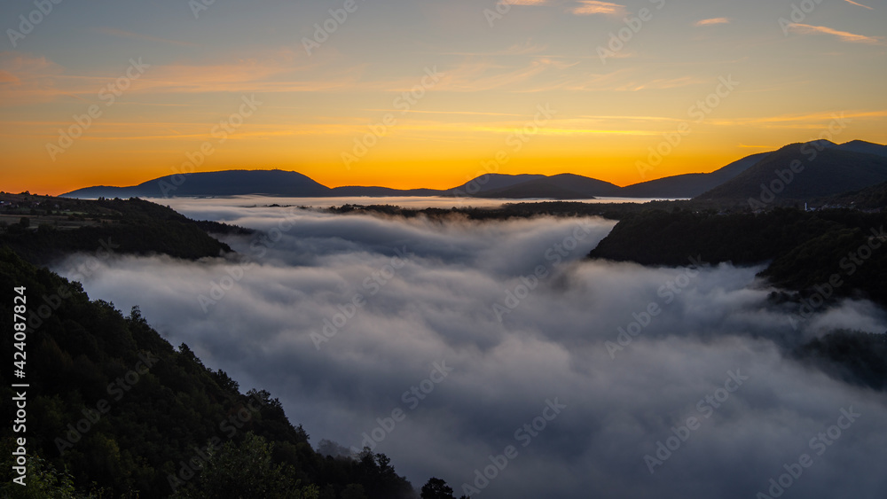 foggy sunrise in the mountains