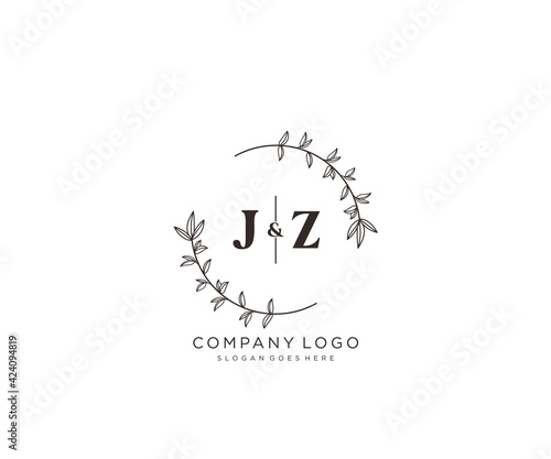 initial JZ letters Beautiful floral feminine editable premade monoline logo suitable for spa salon skin hair beauty boutique and cosmetic company. photo