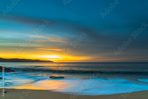 High Cloud Sunrise Seascape with Soft Shades of Colour © Merrillie