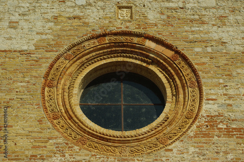 The rose window of the church of Santa Maria di Propezzano. Abruzzo - Italy
